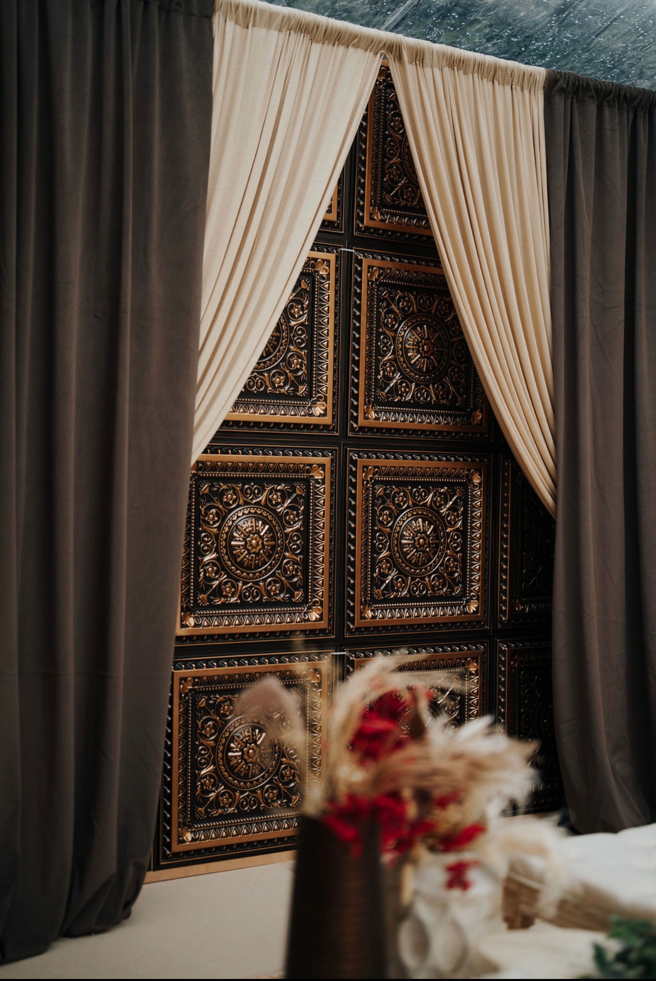 Ornate backdrop with draping — Regiis Events